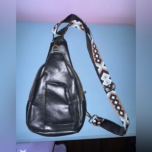 Elegant Black Leather Belt Bag with Patterned Strap